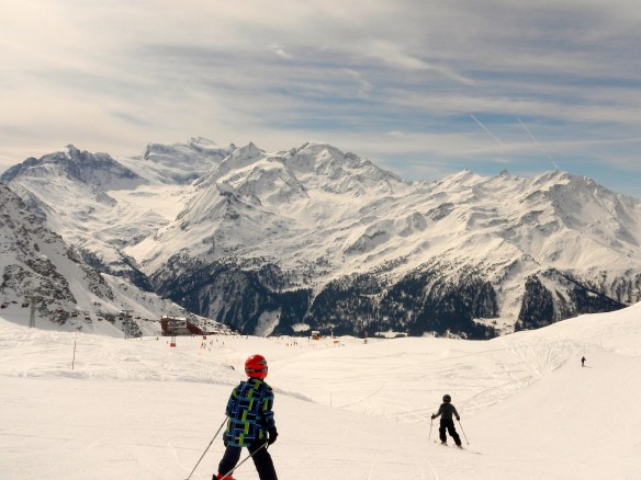 Two boys on the piste at around 2500 m. 
