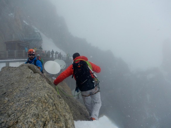 Yannick crossing the summit of the final gendarme, heading for the viewing platform that is the exit from the climb.
