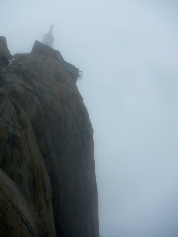 Aiguille du Midi looms above us in the cloud