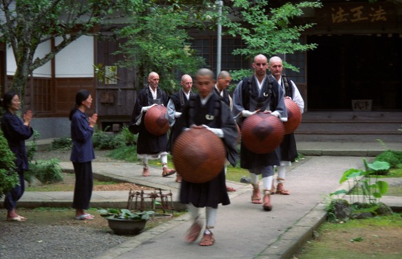 Monks departing for takuhatsu