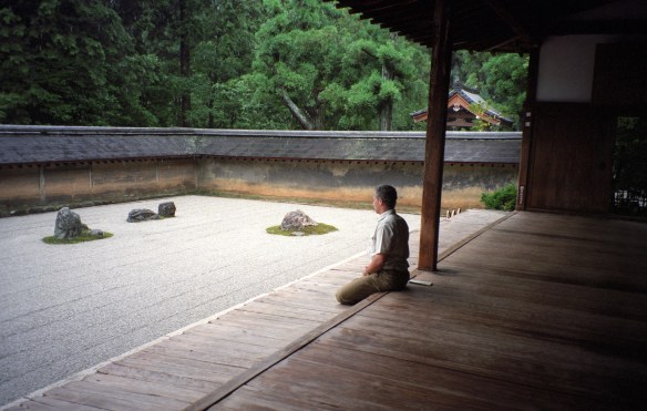Contemplating the rock garden at Ryoanji Temple in Kyoto
