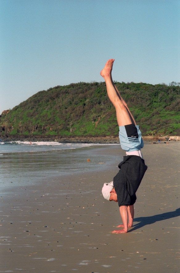 Hogen-san doing yoga on the beach at Ballina, 1995.