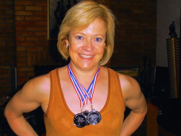 The happy swimmer is back from the 2014 French Masters Swimming Competition (Tournoi Internationale de Paris) with three silver medals in the 100 medley, 200 freestyle and 400 freestyle.